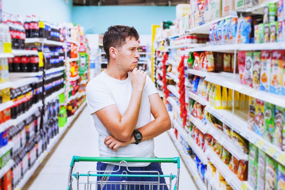 shutterstock_531012568_man_buy.jpg