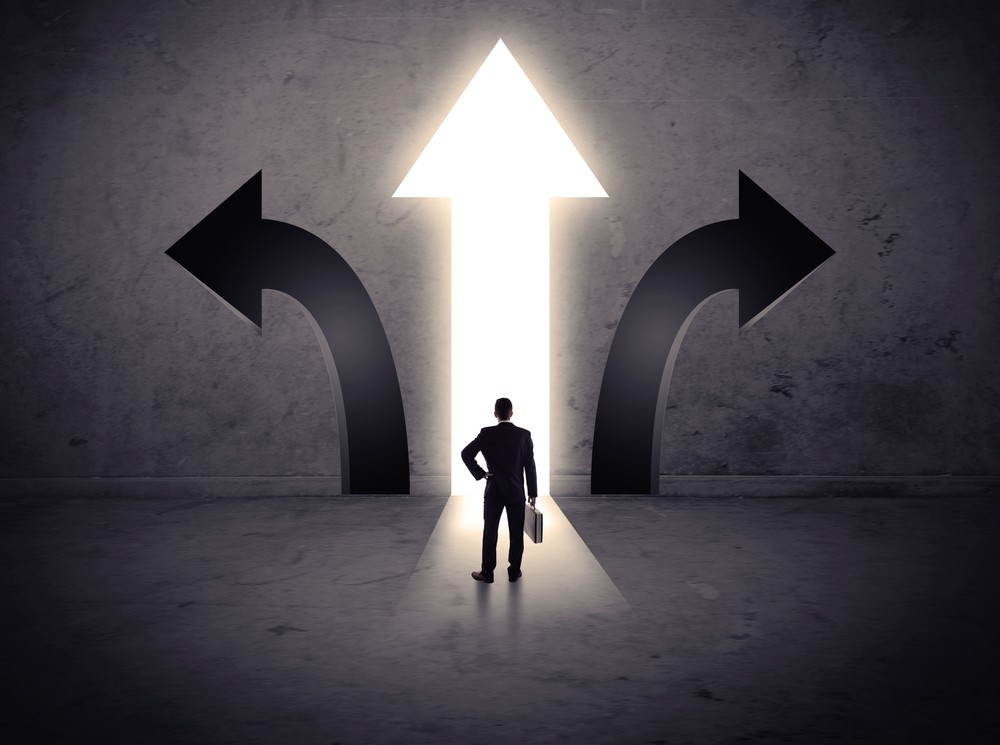 A businessman in doubt, having to choose between t