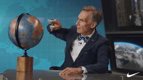 guy spinning globe