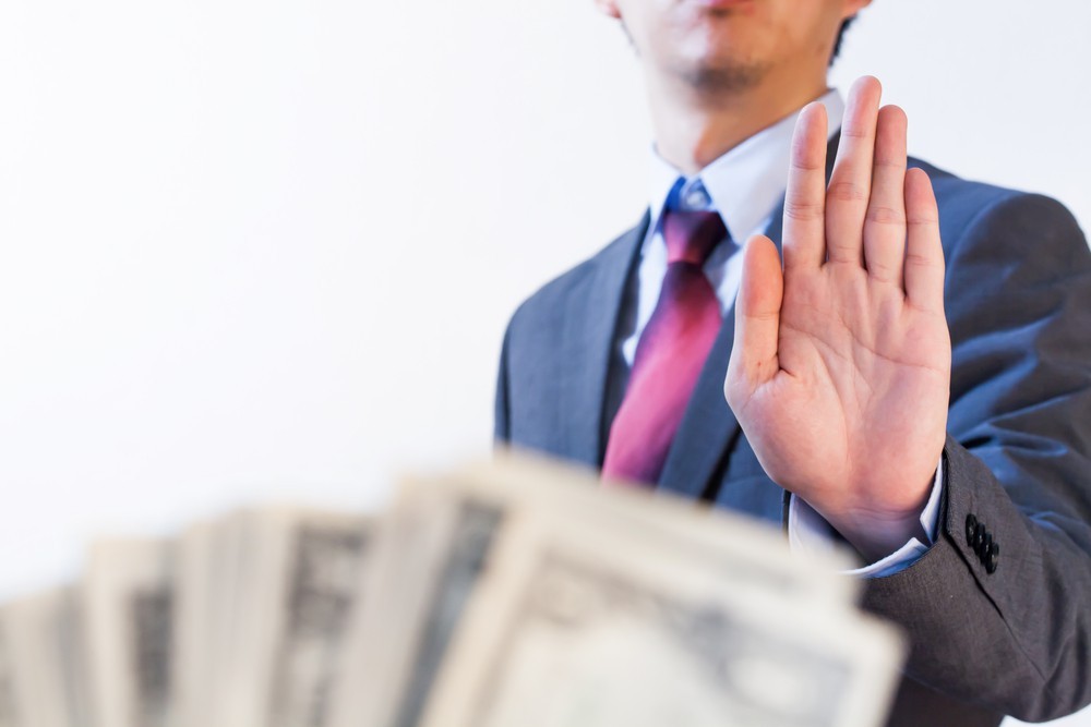 reject money bribery shutterstock